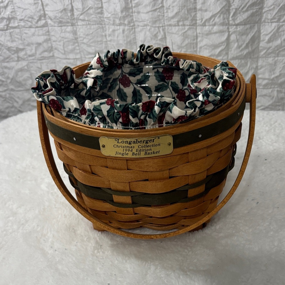 Longaberger natural and dark green woven basket with holly liner
